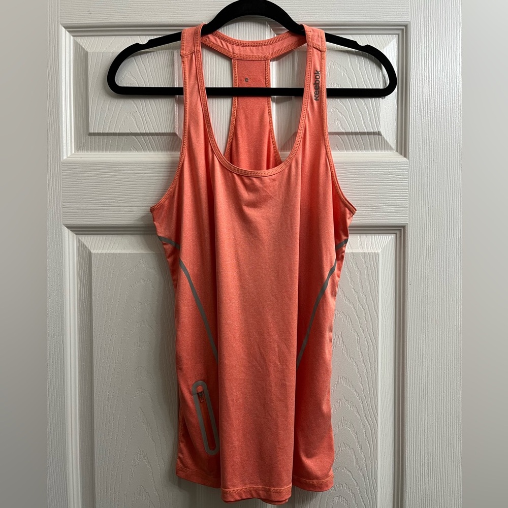 REEBOK workout tank shirt - Size M
Only worn a couple times.